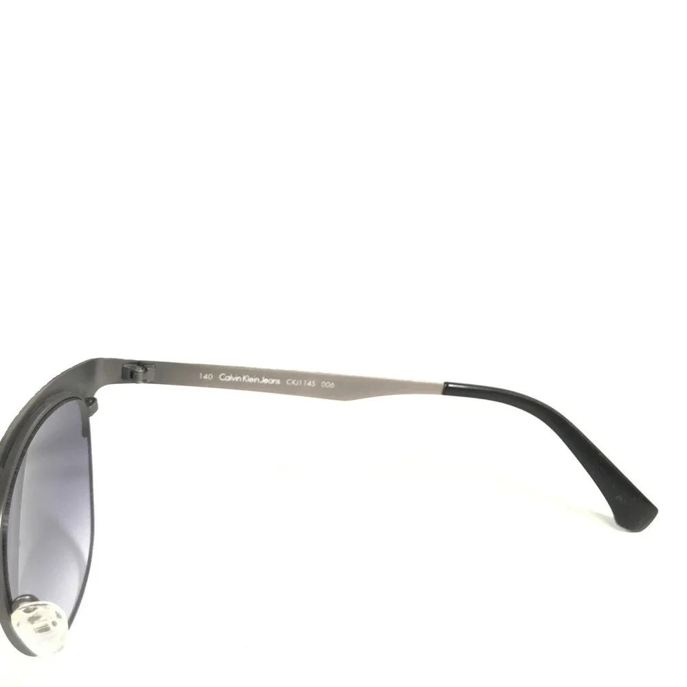 Calvin Klein Jeans Sunglasses CKJ114S 006 Gray Round Frames with Purple Lenses